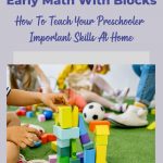 Math with Blocks: Image: Children sitting on floor, one child stacking blocks